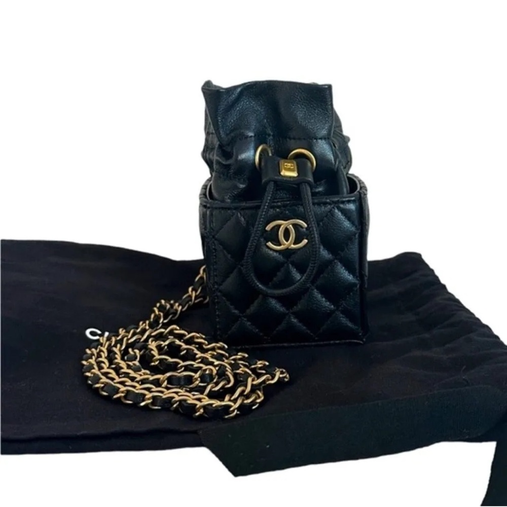 CHANEL Black and Gold Mini Quilted Bag